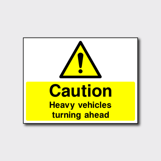 Caution Heavy Vehicles Turning Ahead Sign