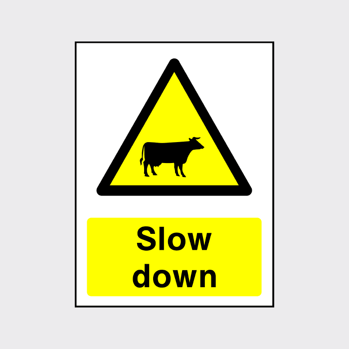 Slow Down Cattle Sign