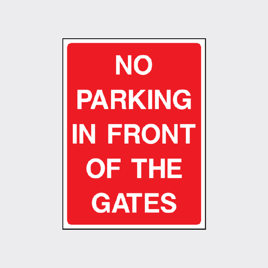 No parking in front of these gates sign