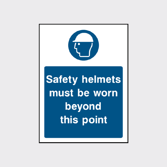 Safety helmets must be worn beyond this point sign