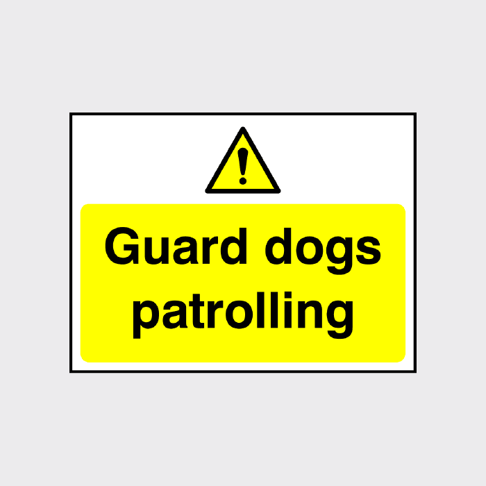 Guard dogs patrolling sign