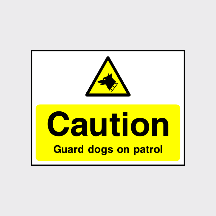 Caution Guard dogs on patrol sign