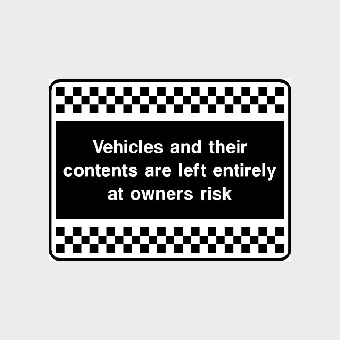 Vehicles and their contents are left entirely at owners risk sign 