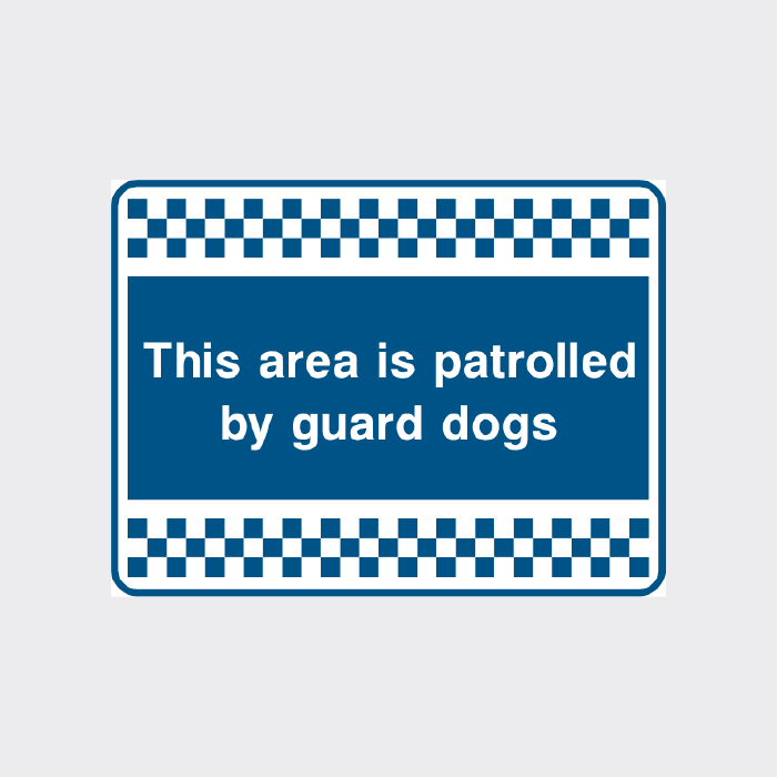 This area is patrolled by guard dogs sign