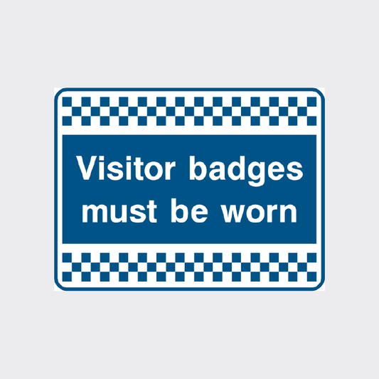 Visitor badges must be worn sign 