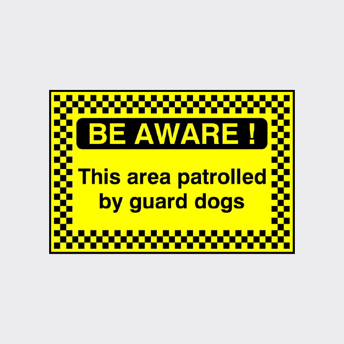 Be Aware! This area patrolled by guard dogs sign